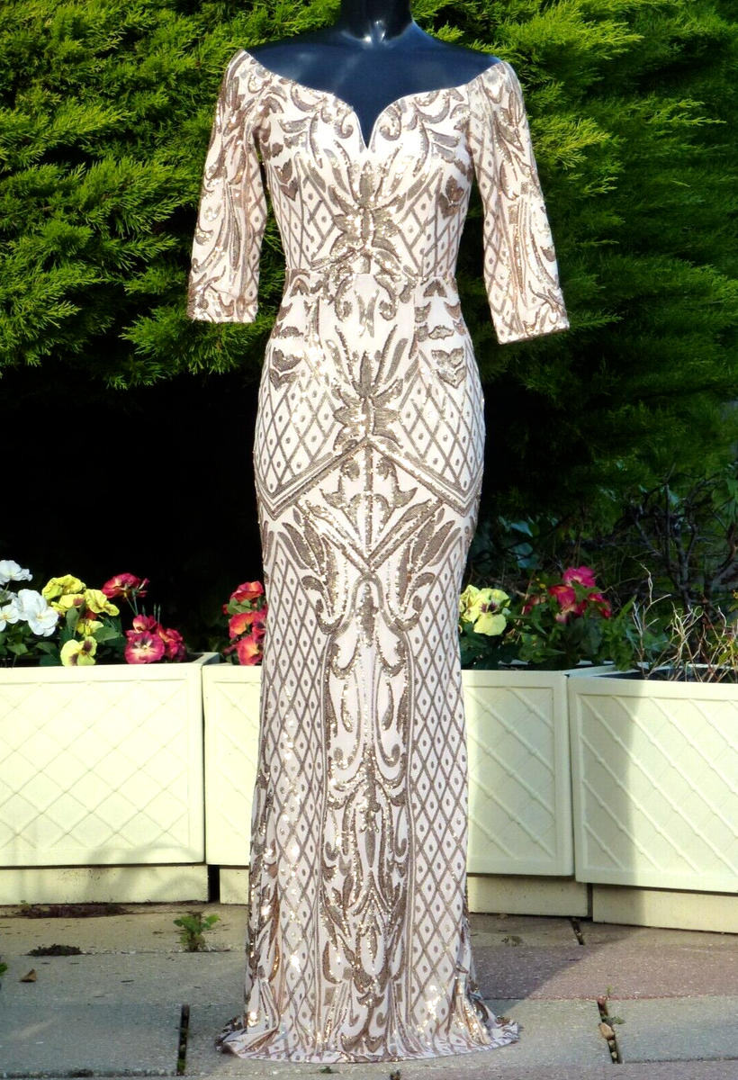 sachin and babi light blue dress Anewsta Modern Champagne-Colored Sophisticated Elegant Sleeveless Halter- Neck Long Dress With 3D Floral Patterns And Sequin Design, Perfect For  Banquets, Dates, And Vacations Champagne Evening Gown Luxury Dress For  Women Champagne Women Dresses main image 0