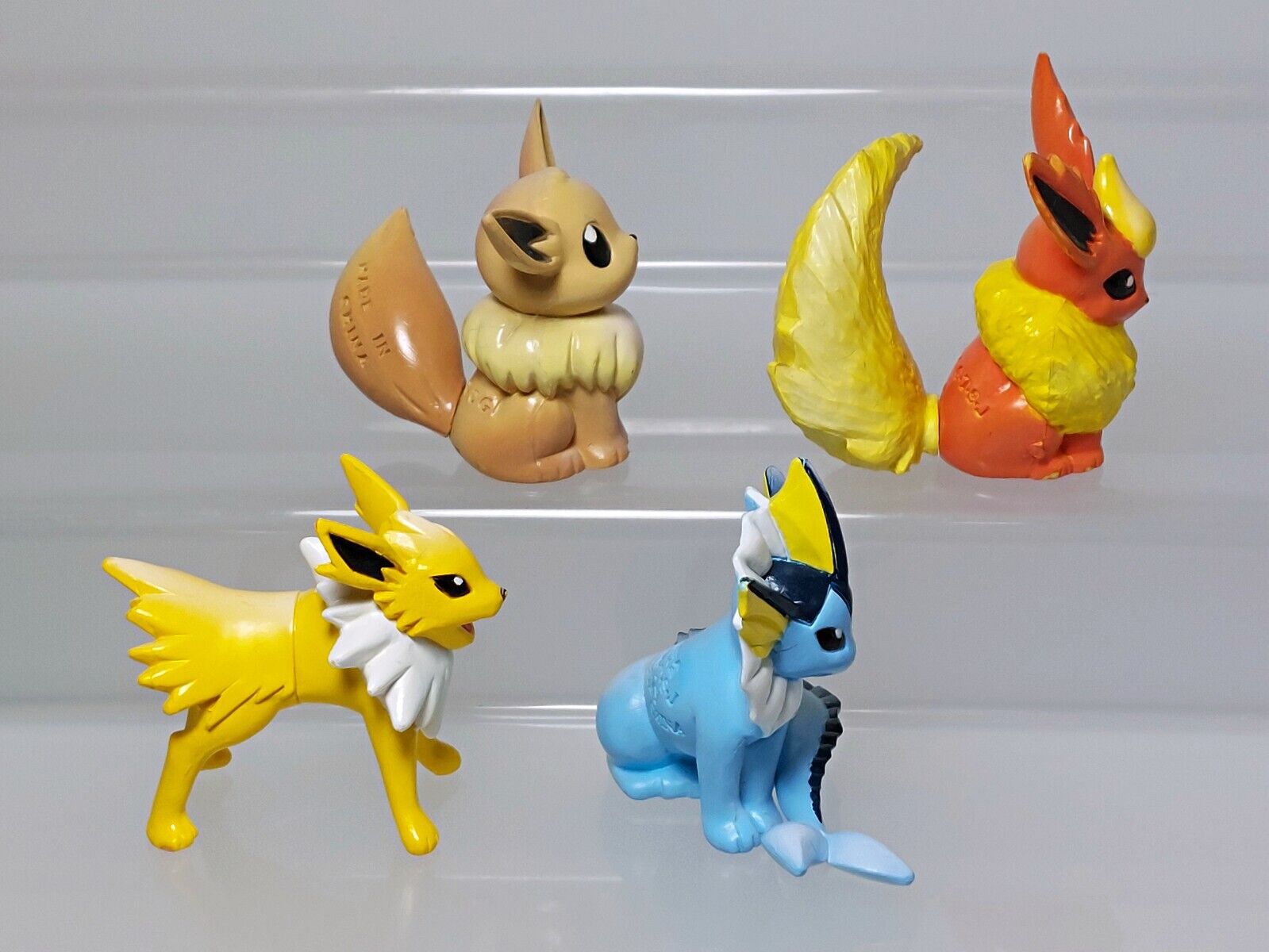 Figuras De Ação Pokémon Eevee, Jolteon, Vaporeon e Flareon