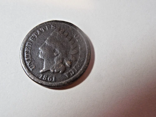 1861 Indian Head Penny in good condition. Strong lettering and date. Corrosion.