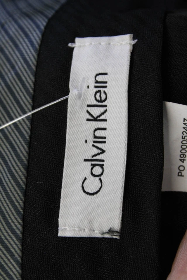 Pantalones de pierna cónica forrados con cremallera texturizados gris talla M de Calvin Klein para mujer Foto 4 de 4
