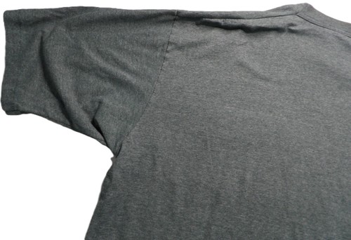 Gray VTG men’s shirt XLT with short sleeves, shown close-up to reveal a single stitch on the neckline.