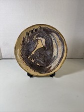 handcrafted ceramic plate dragon motif