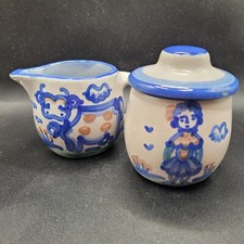 M.A. Hadley Sugar Bowl and Creamer Pottery Girl And Cow With Lid