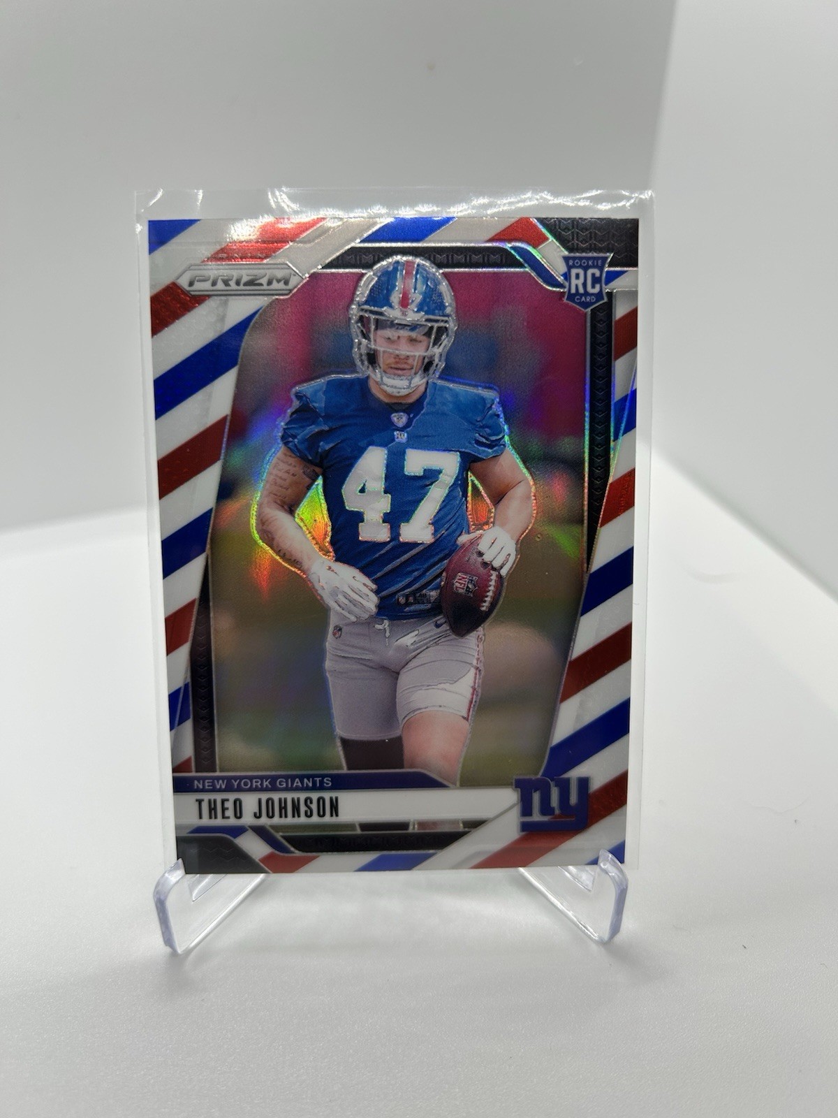 2024 Panini Prizm - Rookies Theo Johnson #390 Red White & Blue Prizm (RC)