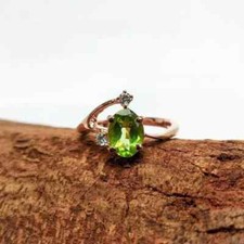 2CT Oval Lab Created Green Peridot Women's Wedding Ring 14K Rose Gold Plated