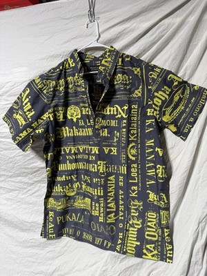Kaulua'e brand men's aloha shirt featuring a black and yellow newspaper print