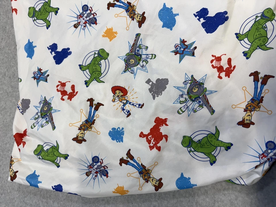 Sábana Ajustable Cuna Disney Pixar Toy Story 4 Woody Buzz Rex Jessie Blanco NoJo Bebé Foto 2 de 4