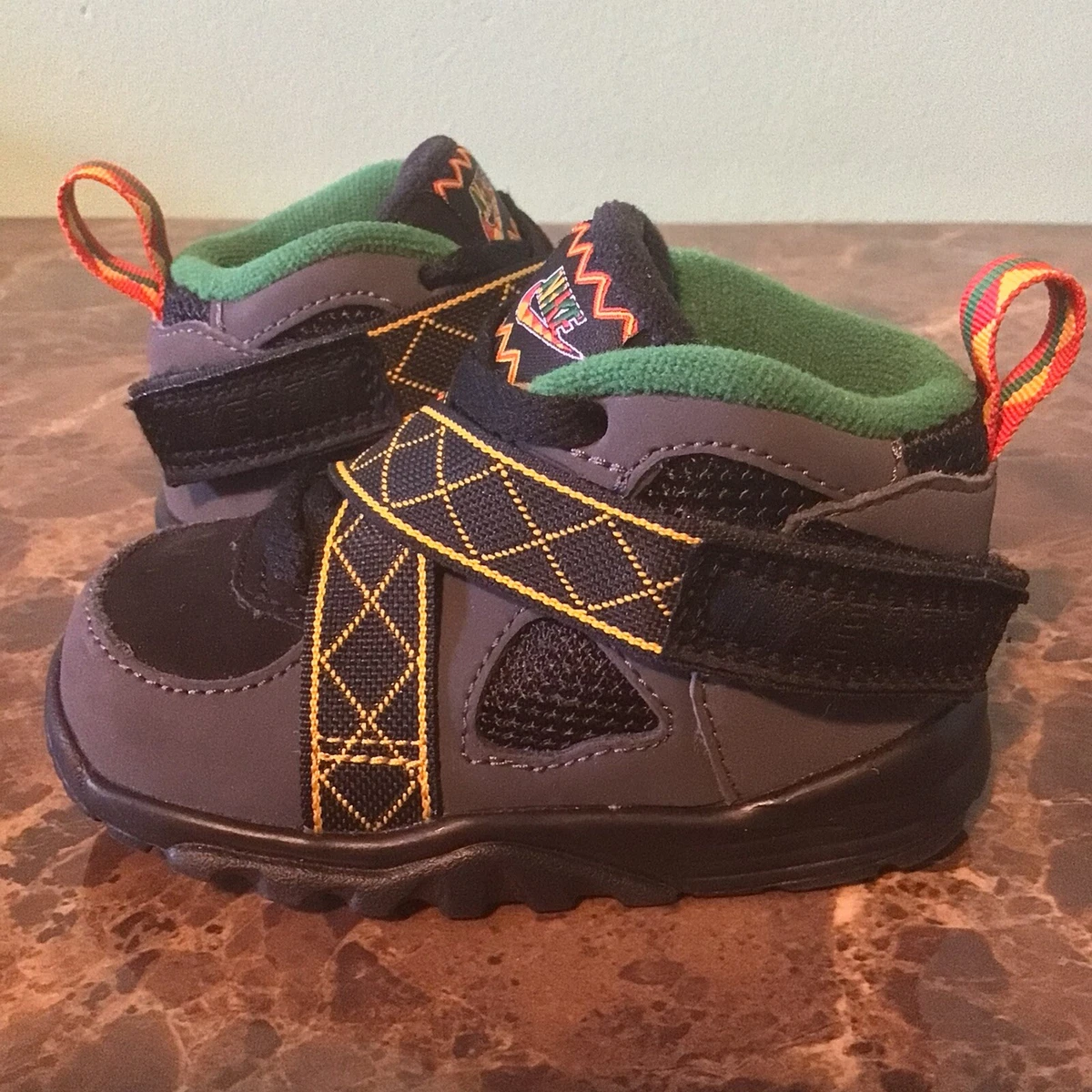 Size 4C - 644415-003 Nike Air Raid Peace Urban Black/Dark Grey/Pine Green