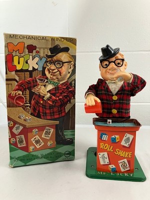 1960's Mr. Lucky Wind Up Marusa Japan Drinking Dice Tin Toy