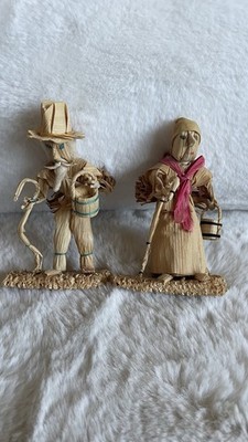 Pair of vintage corn husk dolls. Intricately done holding cane And Bucket.