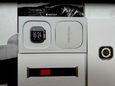 Apple Watch Ultra 49mm Titangehäuse mit Orange Alpine Loop Armband, Medium (GPS