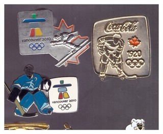 Vancouver 2010 Olympics pins: hocley goalie; skier; Coca Cola hockey
