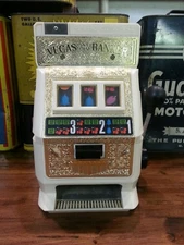 "TOY SLOT MACHINE BY POYNTER PRODUCTS" 
