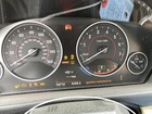 Black BMW 430I speedometer with 2018 model, showing 60 mph, brake light, and warning icons.