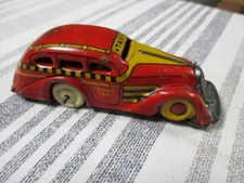 VINTAGE MARX TIN LITHO WIND UP 'TRICKY TAXI'-ANTIQUE