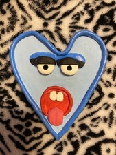 Blue Heart clay dish with facial features