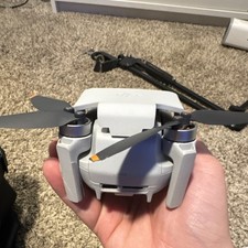 DJI Mini 4K Drone with Remote Controller, Charging Hub, and Carrying Case