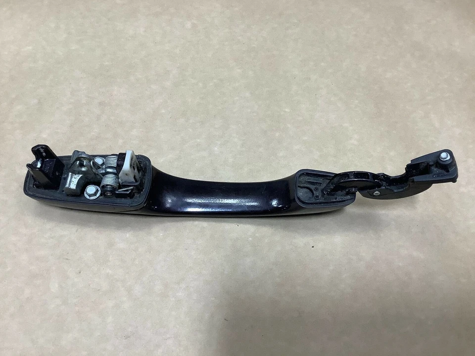 Volkswagen Routan 2010 manija de puerta exterior trasera izquierda lado del conductor negra OEM+ Foto 4 de 4