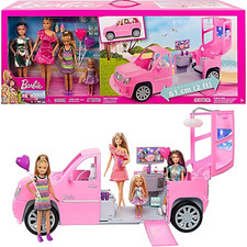 barbie limo and 4 dolls