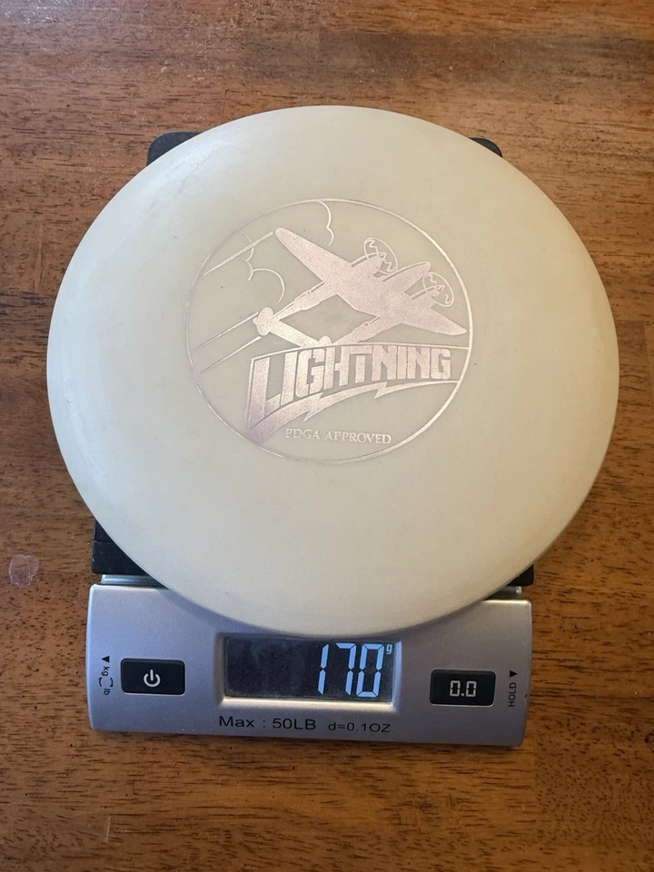 Lightning Disc Golf P-38 Stamp Glow White 170 grams disc golf - Image 3 of 4