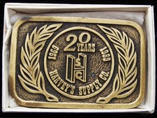IK17116 NOS VINTAGE 1989 HARVEY'S SUPPLY CO 20 YRS BELT BUCKLE