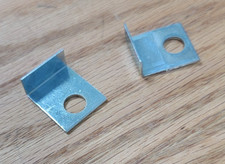 1957 CHEVY FRONT SPLASH PAN to FENDER RETAINER "L" BRACKETS pair ** USA MADE **