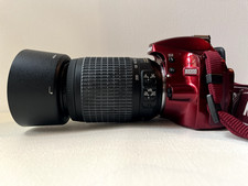 Nikon D3200 With 55-200mm Lens, Battery, Charger, Camera Bag and transfer cord.