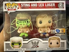 FUNKO POP WWE 2 PACK SIGNED BY STING AND LEX LUGER WITH JSA COA