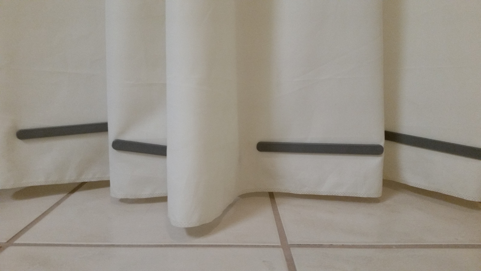 Shower curtain weights prevent your curtain or liner from drafts