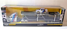Transporter Mack Anthem and 1988 BMW M3 1:64 Scale Diecast Model Silver Maisto