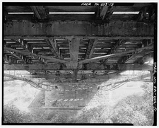 15. GENERAL VIEW UNDERNEATH DECK SHOWING KING POST, TIE RODS AND STRINGER