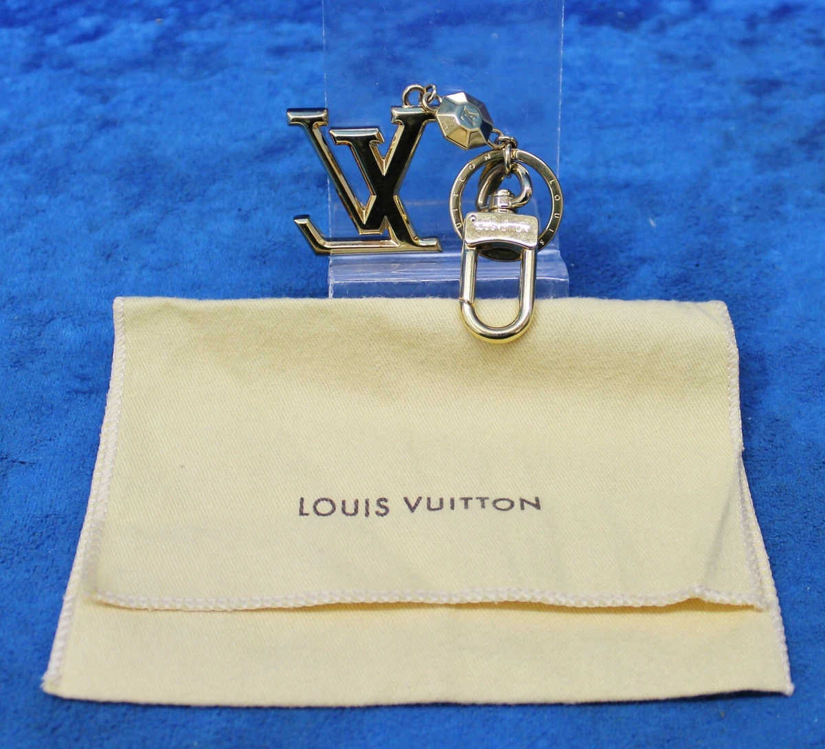 Louis Vuitton Facettes Bag Charm & Key Holder Gold Logo M65216 Made in Italy