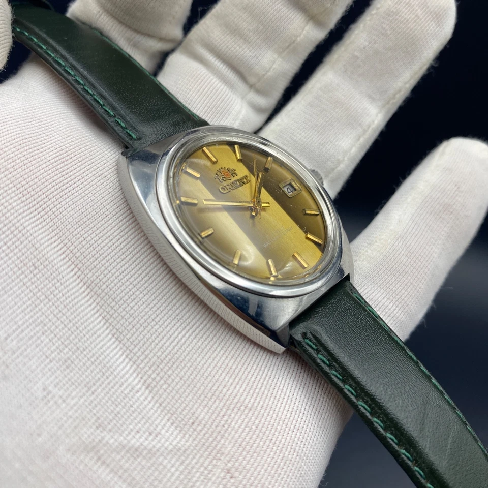 Reloj para hombre Orient años 60 NOS ojo de tigre esfera de piedra cuerda manual muy raro y de colección Foto 2 de 4