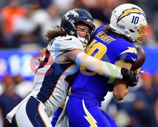 Alex Singleton Tackles Justin Herbert Denver Broncos 8x10 NFL Football Photo