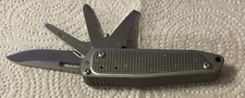 New Leatherman FREE T2 Pocket Knife Multi-tool Perfect Condition Great Gift
