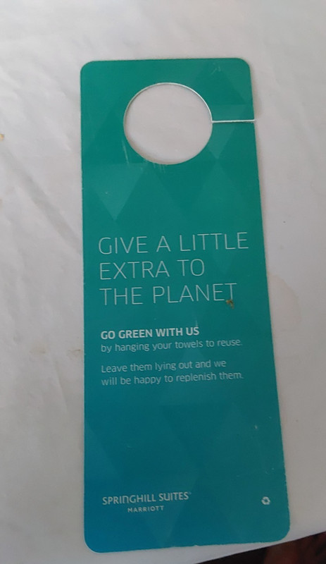 NICE MOTEL DOOR HANG TAG - SPRINGHILL SUITES   GIVE A LITTLE EXTRA TO THE PLANET