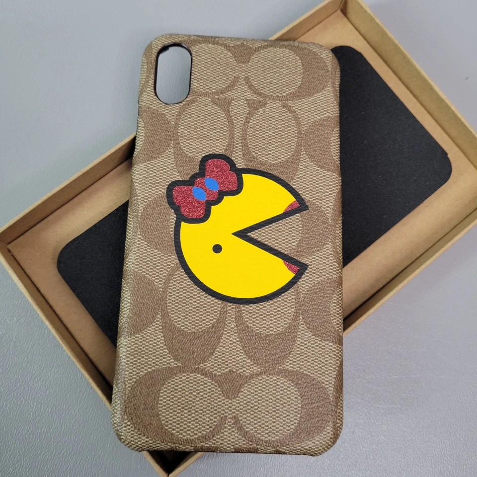 Lote de 3 fundas Coach Signature Ms. Pac Man iPhone X amarillas y caqui nuevas F73706 Foto 4 de 4
