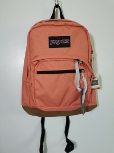 peach colored jansport backpack