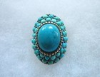 A  SPLENDID TURQUOISE AND STERLING DOMED AND ROWED RING SX.925 — photo 1