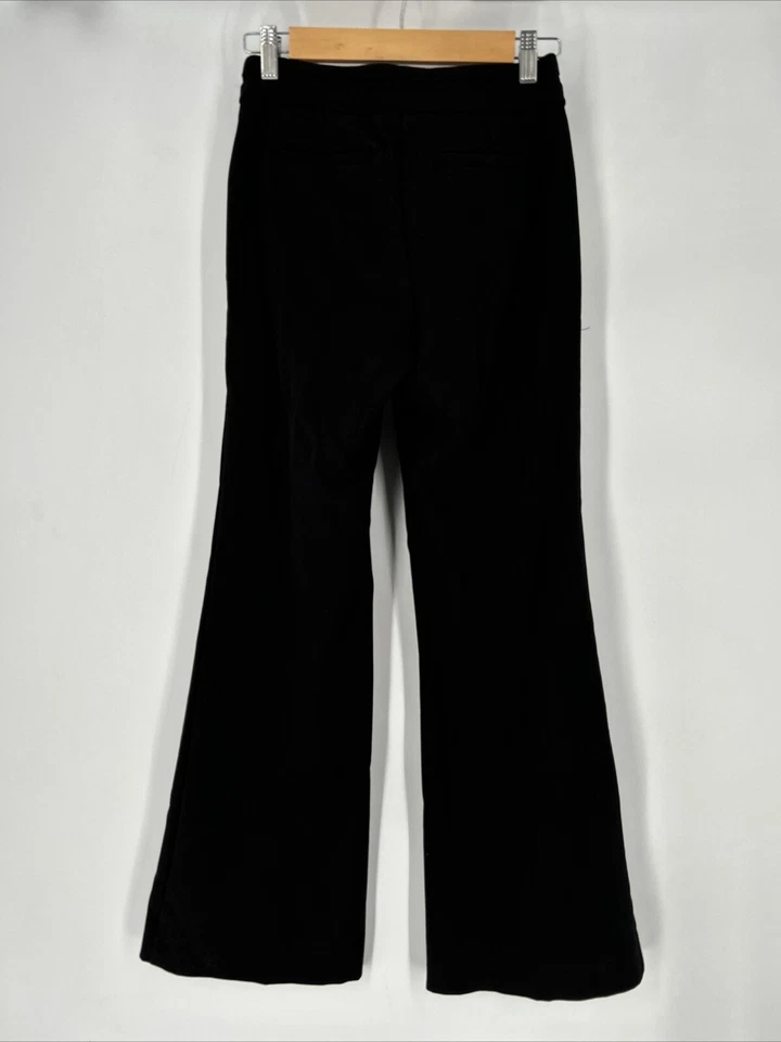 Pantalones acampanados XOXO Y2K para mujer talla O Bellbottoms negros elásticos frente plano tiro bajo Foto 2 de 4