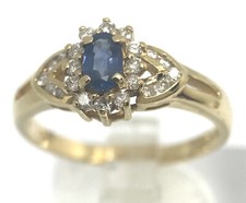 sapphire diamond cluster ring 18ct gold size M, oval, Birmingham hallmark.