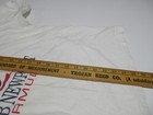 White Sz L men’s T-shirt with red “Bermuda” text, Troyan Seed Co. logo, and yellow measurement tape.