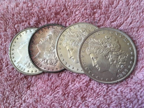 MORGAN SILVER DOLLAR COINS.  LOT OF 4  AU./ DETAILS  PRE. 1921 LOT # 11