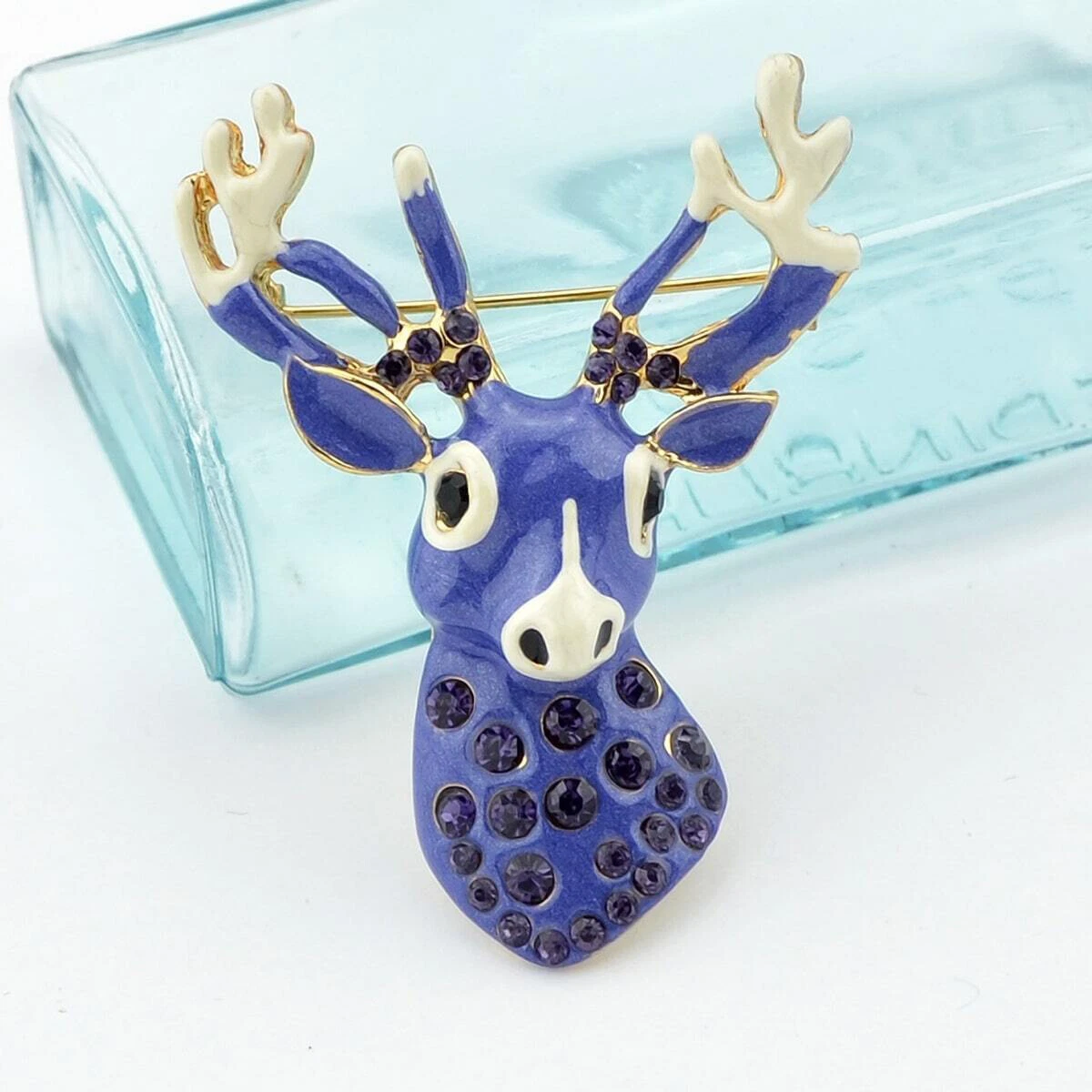 Reindeer brooch deals