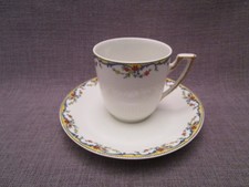 Tasse a café ancienne en porcelaine de Limoges