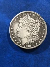 1884 CC Morgan Silver Dollar circulated with good details