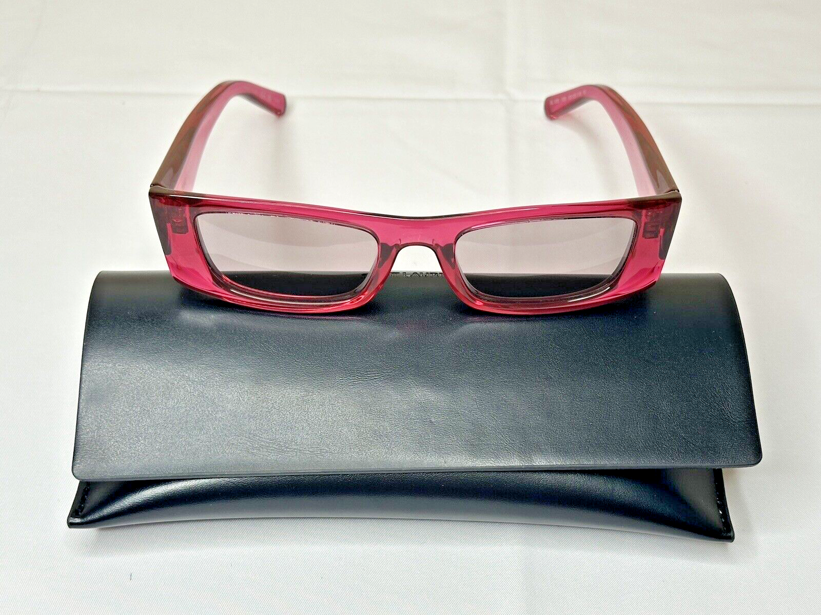 Occhiali da sole unisex Saint Laurent SL 553 003 rosa viola stretti con custodia originale