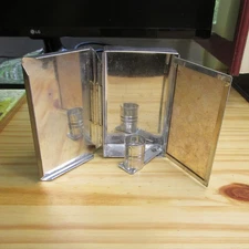 Reproduction of a folding Colonial Tin Candle Lamp with Mica window