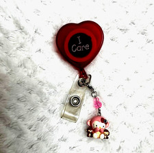 Sanrhello kitty charm.ID badge holder. Hear no evil, speak no evil, see no evil.