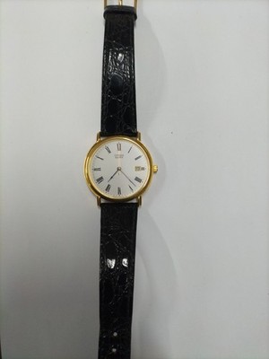 CITIZEN VINTAGE QUARZ DATE GOLD TONE DRESSING WATCH, MAKE IN GERMANY QD9642.